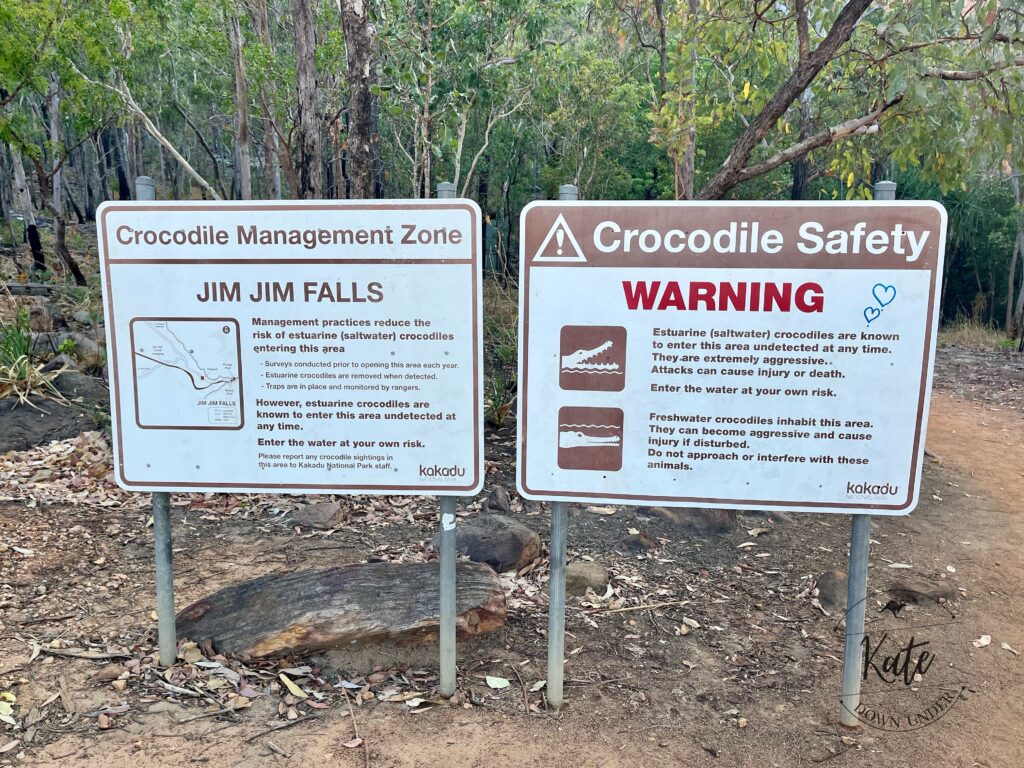 Crocodile warning signs at the parking lot