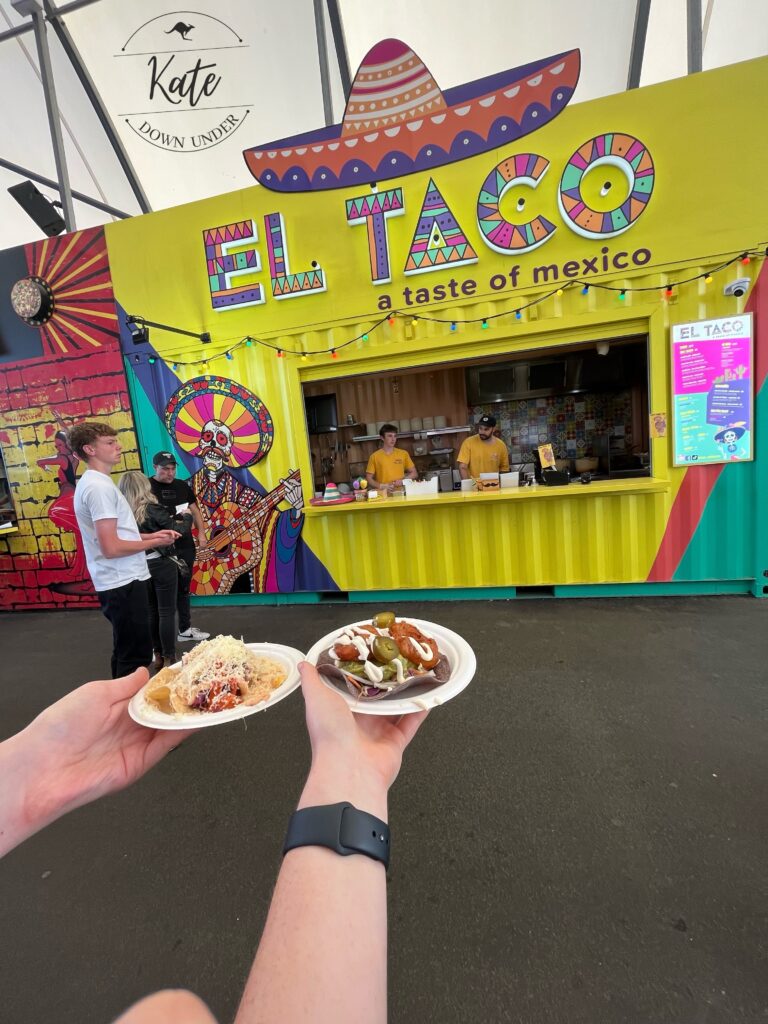 two tacos, beef and prawn, at "el taco" stand