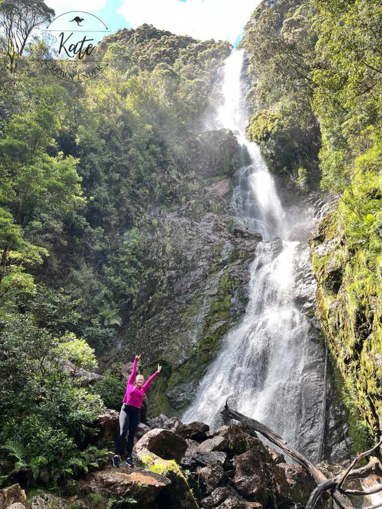 Kate standing in front of Montezuma Falls