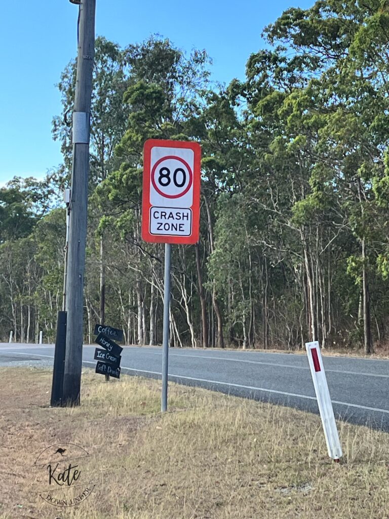 a road sign that reads 'maximum 80, crash zone'
