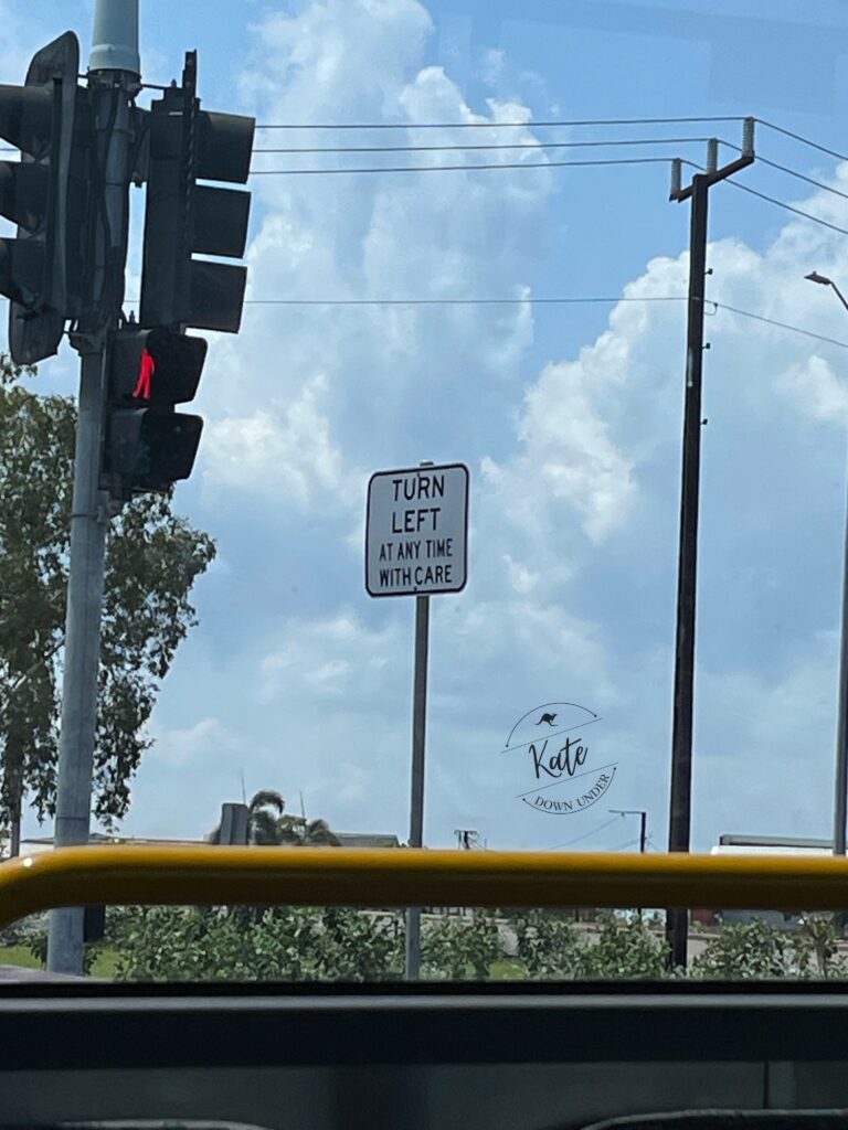 a road sign that reads 'turn left at any time with care'
