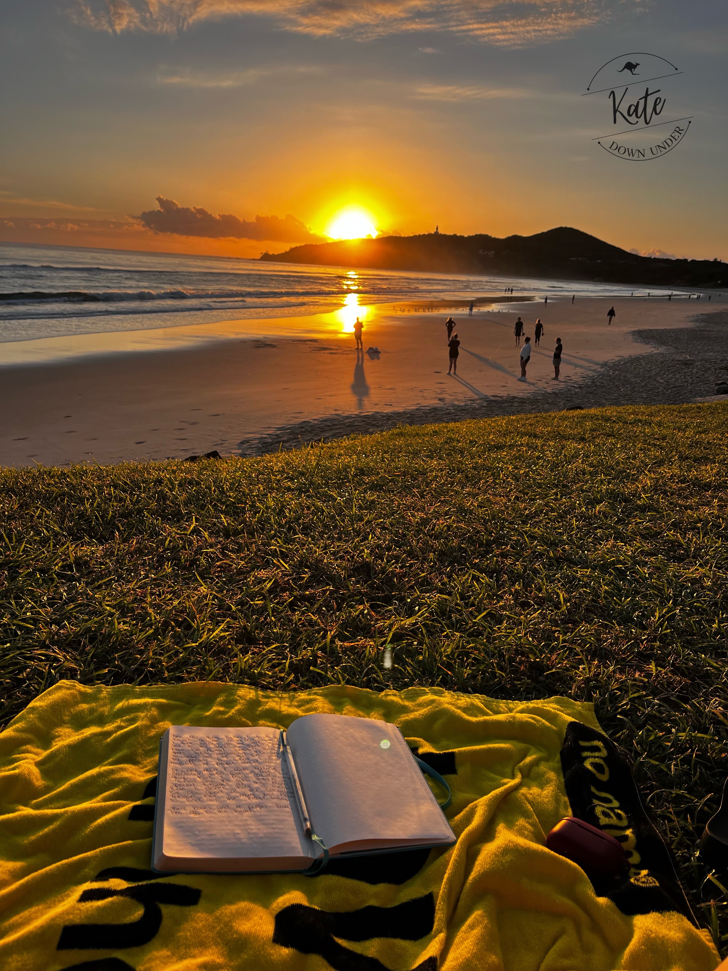 Journalling as the sun rises over The Pass, Byron Bay